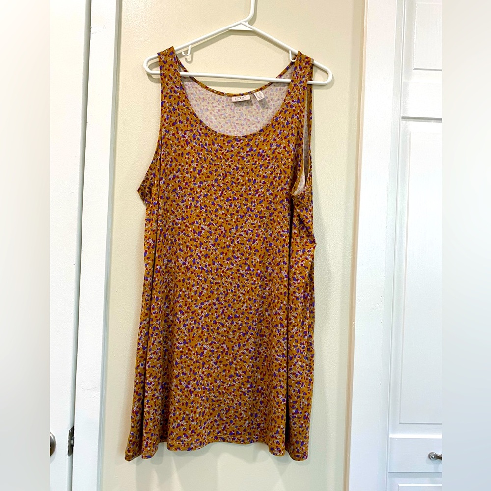 Woman’s tunic top by LOGO Lori Goldstein. Size 1X.